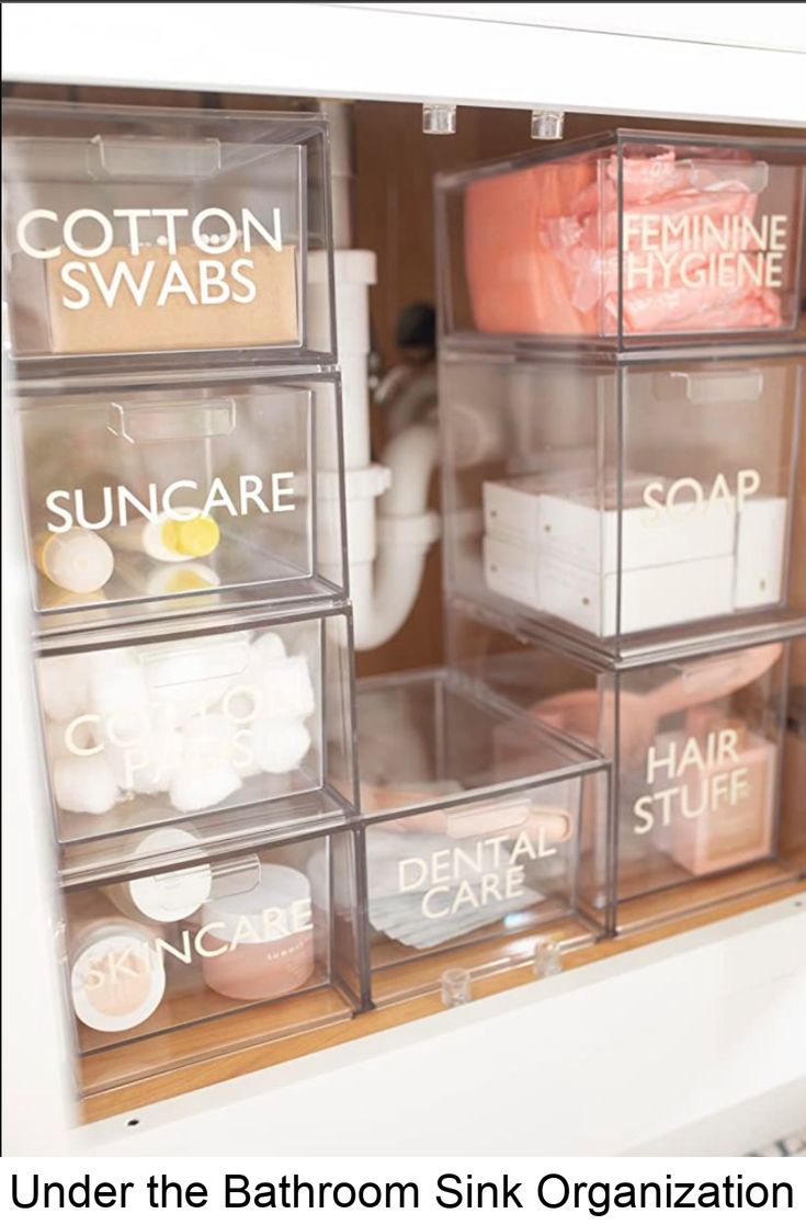 the bathroom sink organization bins are organized with clear plastic containers and labeled under the bathroom sink organization bins