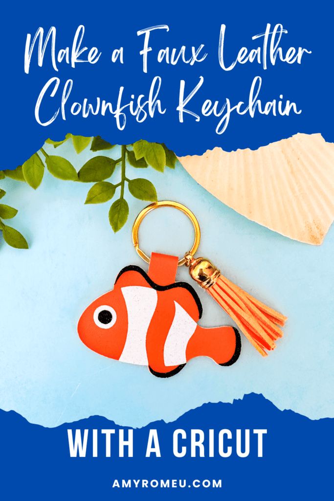 an orange and white clown keychain on top of a blue background with the words make