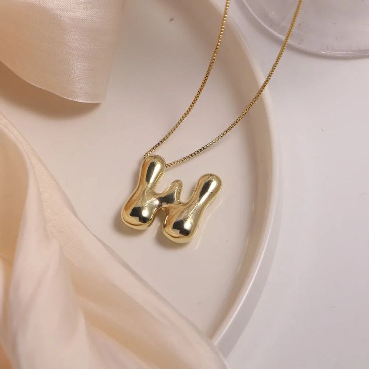 44412897624249 Gold Trendy Initial Necklace, Trendy Gold Initial Necklace, Trendy Gold Name Necklace, Modern Gold Name Necklace, Modern Gold Initial Pendant Necklace, Trendy Gold Metal Name Necklace, Trendy Gold Clavicle Chain Name Necklace, Trendy Gold Name Necklace With Clavicle Chain, Modern Gold Initials Name Necklace