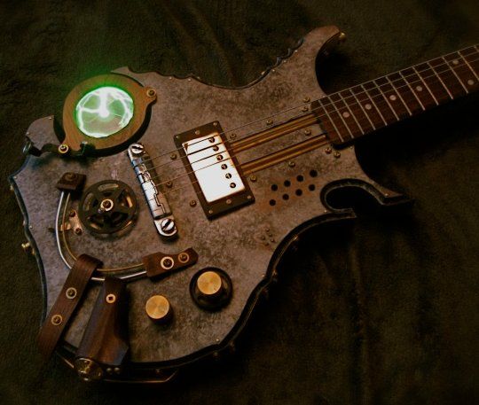 an electric guitar sitting on top of a table