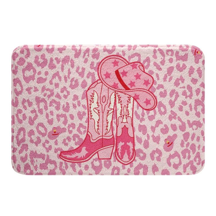 a pink and white animal print wallet with cowboy boots on it