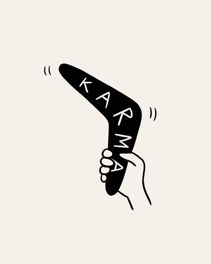 a hand holding a black hair dryer with the word kaana written on it