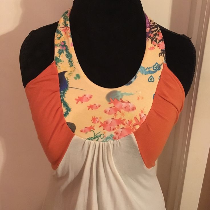 New But Never Worn,Hooks In Back At Neck,Unique Details Under Arm,Logo Stitched Near Hem,95% Modal,5% Spandex,Size Small But Runs A Lil Large Bin (D-31) Fitted Color Block Tops For Beach, Fitted Color Block Beach Tops, Stretch Orange Tank Top For Summer, Multicolor Racerback Top For Spring, Fitted Color Block Tops For Vacation, Casual Patchwork Tank Top For Beach, Summer Beach Tank Top With Patchwork, Beach Patchwork Tank Top, Fitted Orange Beach Top