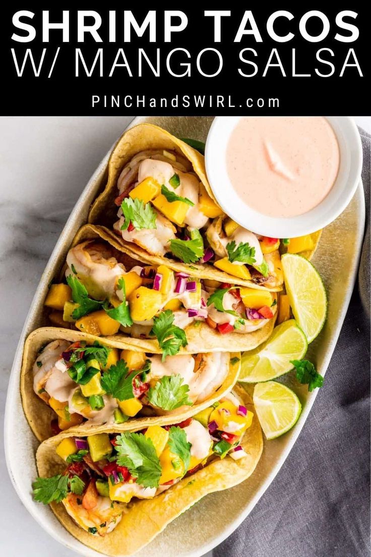 shrimp tacos with mango salsa on a plate