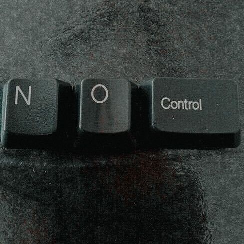 a black keyboard with the word control written on it