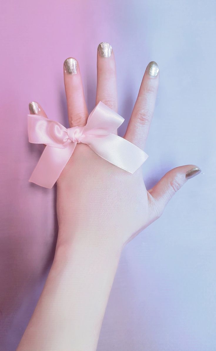 "Feel more feminine when you wear this pink satin ribbon bow around your finger!  Bow is attached to a 2.75\" elastic band." Cute Satin Bow For Gifts, Pink Ribbon Bow For Spring, Adjustable Ribbon Bow Gift, Pink Bow For Spring Party, Adjustable Pink Bow For Party, Cute Satin Bow Tie As Gift, Adjustable Satin Bow For Gifts, Pink Bow Gift For Spring, Pink Satin Wedding Bow