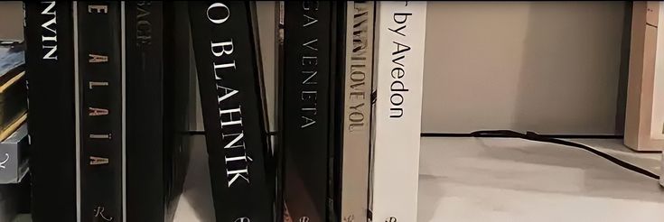 there are many books on the shelf next to each other