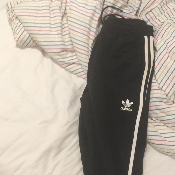 Black Adidas Pants A Classic Brand New Casual Jogging Pants With Three Stripes Branding, Spring Athleisure Joggers With Three Stripes Branding, Spring Athleisure Joggers With Three Stripes, Casual Jogging Pants With Three Stripes, Casual Sweatpants With Side Stripes For Spring, Casual Spring Sweatpants With Side Stripes, Spring Streetwear Joggers With Three Stripes Branding, Spring Joggers With Side Stripes For Jogging, Trendy Sweatpants With Side Stripes For Spring