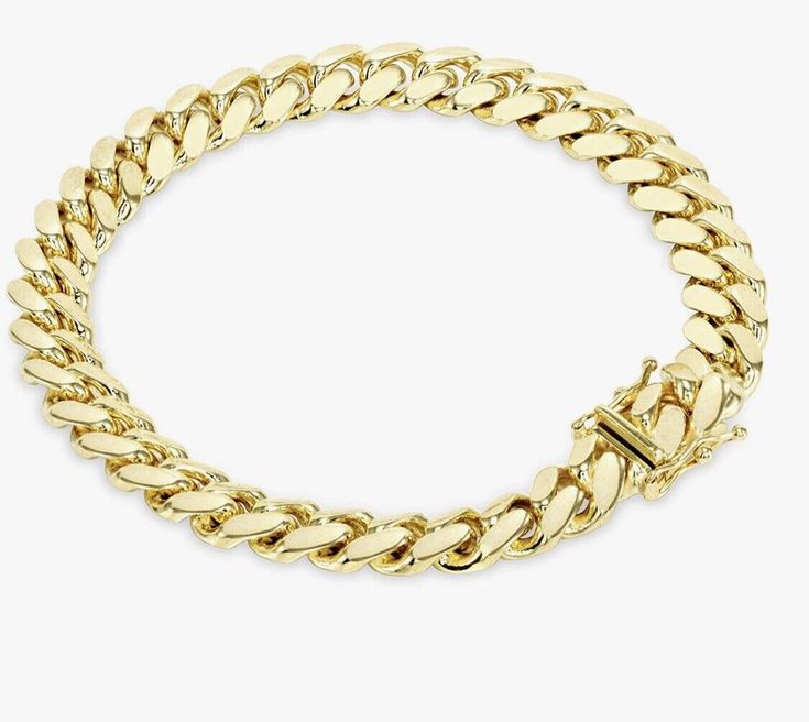 Brand new 14k yellow gold chain featuring modern miami cuban bracelet. This stylish bracelet is box locks with 14K stamp. Finished in high polished finish that gives this bracelet a stunning shiny look that lasts for many years. Brand new and high quality , this bracelet will make a perfect gift for a loved one, or make a great addition to your own fine jewelry collection.  Please note, THIS  Bracelet IS Solid GOLD, not plated or filled. Necklace Specifications: Type: Miami Cuben / Bracelet  Met Luxury Yellow Gold Cuban Link Bracelet With Curb Chain, Luxury 14k Gold Cuban Link Bracelet, Yellow Gold Cuban Link Bracelet With Solid Construction, Luxury Gold Chain Cuban Link Bracelet, 14k Yellow Gold Cuban Link Chain Bracelet, Modern 14k Gold Cuban Link Bracelet, Luxury 14k Yellow Gold Cuban Link Bracelet, Luxury Polished Cuban Link Bracelet, 14kt Gold Jewelry