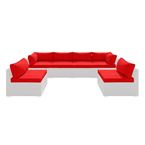 a red and white couch sitting on top of a table