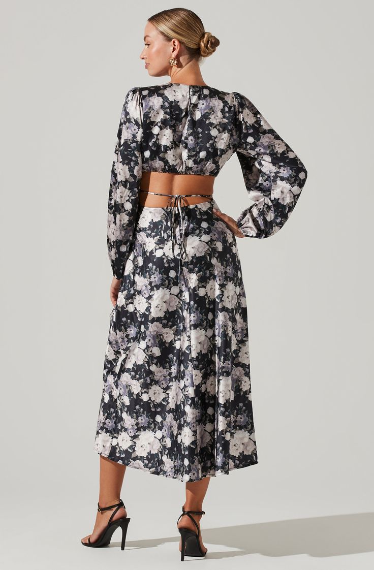 This dreamy dress features a statement floral print throughout. Round neckline leads to a fitted bodice and side cutouts with a tie waist accent. Long, voluminous sleeves with elasticized cuffs. Concealed zip closure. Cutout Midi Dress, Voluminous Sleeves, Dreamy Dress, Green Midi Dress, Wedding Plans, Social Club, Floral Midi Dress, Black Midi Dress, Invisible Zipper