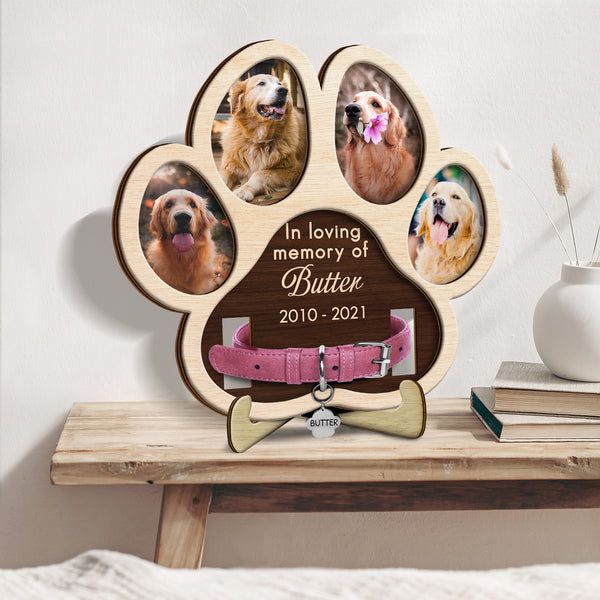 a dog's paw with four pictures on it and a bow tie in the center