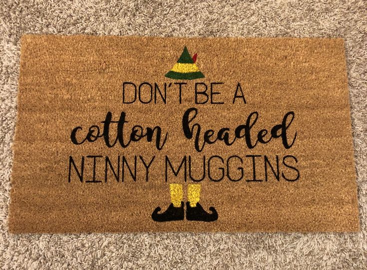 a door mat that says, don't be a cotton headed ninny mugins