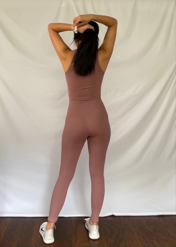 seamless high waisted model is 5'3" wearing a small/medium High Waist Activewear With Built-in Bra For Workout, Seamless 4-way Stretch Leggings For Loungewear, High Waist Fitted Seamless Tights, High Waist Yoga Activewear With Built-in Bra, Compressive High-waist Activewear With Built-in Bra, Stretch Seamless Leggings, Stretch Seamless Leggings Made Of Elastane, Fitted Bottoms With Built-in Bra For Pilates, Seamless Leggings For Loungewear