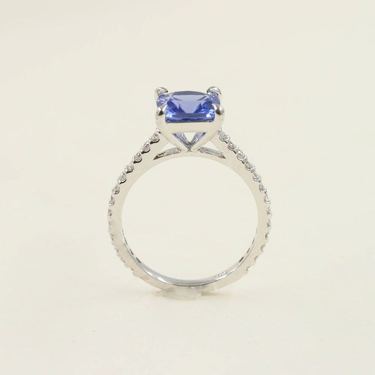 ◈ Diamond Fine Jewelry ◈ ♥ This stunning engagement ring has a center stone that is AAA 7mm Cushion shaped Tanzanite. Color of stone is natural and set on a solid 14k Solid Gold. This ring is very simple, dainty, and very pretty when worn. ♥ Tanzanite is a gemstone that fulfills the traits of beauty, durability, and rarity. The gemstone is also believed to help recover from any severe illness and severe amounts of stress. ◈ Item Details ◈ --- Handmade in United States --- Made to Order --- Metal Sapphire Ring With Brilliant Cushion Cut, Cushion Cut Brilliant Sapphire Ring For Anniversary, Sapphire Rings With Brilliant Cushion Cut, Sapphire Diamond Ring With Prong Setting Cushion Cut, Cushion Cut Sapphire Diamond Ring For Anniversary, Anniversary Sapphire Diamond Ring Cushion Cut, Classic Sapphire Ring With Moissanite Accent Stones, Sapphire Cushion Cut Diamond Ring For Anniversary, Sapphire Cushion Cut Ring With Prong Setting