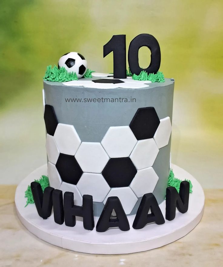 a soccer themed birthday cake with the number ten on it