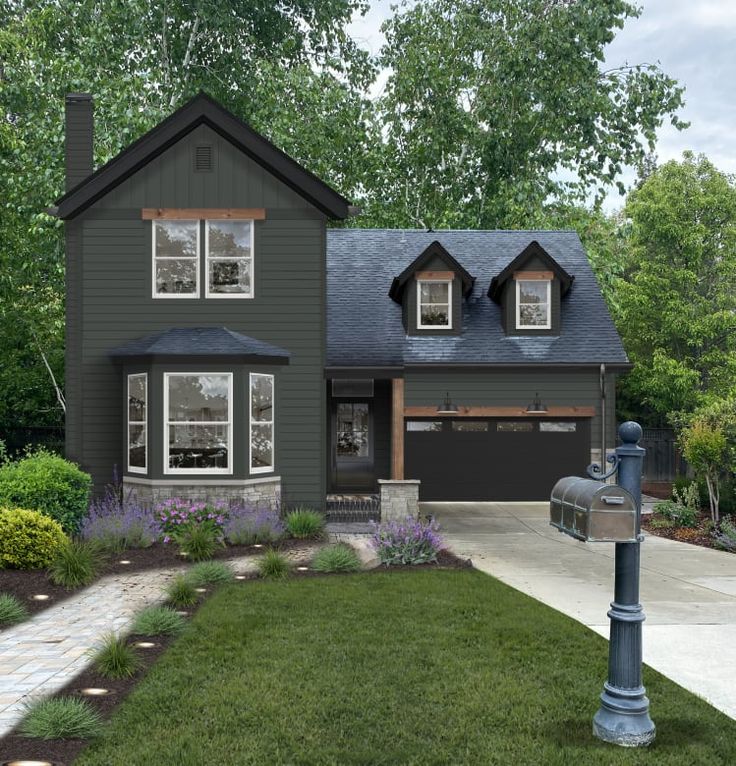 this is an artist's rendering of the front of a house with landscaping around it