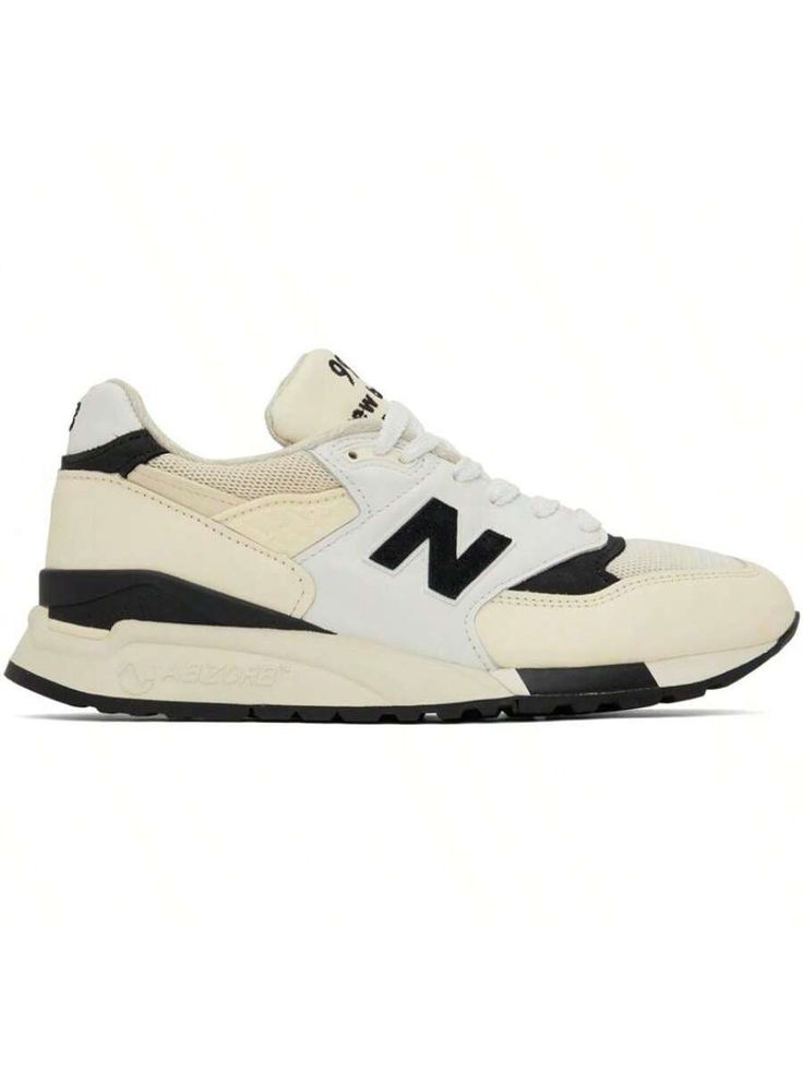 New Balance 
Off-White Made in USA 998 Sneakers 
Low-top paneled buffed leather and mesh sneakers in off-white. 
. Lace-up closure 
. Logo embroidered at padded tongue 
. Padded collar 
. Logo appliqué at sides 
. Logo embroidered at heel tab 
. Mesh lining 
. ABZORB® foam rubber midsole 
. Treaded rubber sole 
Supplier color: White 
Upper: leather, textile. Sole: rubber. 
Made in United States. 
241402M237183 
Off-White Made In USA 998 Sneakers default         Sports & Outdoor Shoes, size featu Classic Cream Sneakers For Sports, Classic Sneakers With Embroidered Logo For Streetwear, Casual Leather Running Shoes With Logo Patch, Cream Round Toe Running Shoes For Streetwear, Cream Sneakers With Boost Midsole For Light Sports, Cream Sneakers With Cushioned Footbed For Streetwear, Cream Sneakers With Cushioned Footbed, Classic Cream Sneakers With Cushioned Footbed, Classic High-top Sneakers With Embroidered Logo