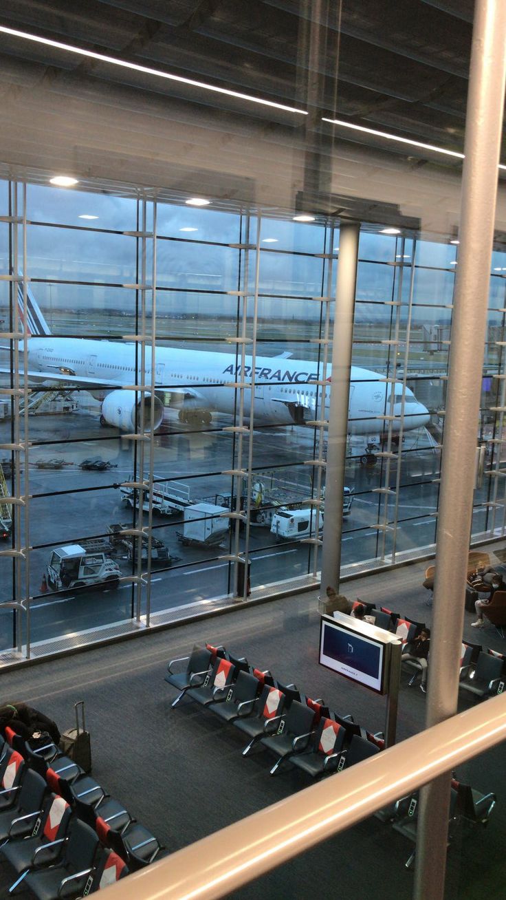 an airport filled with lots of parked airplanes