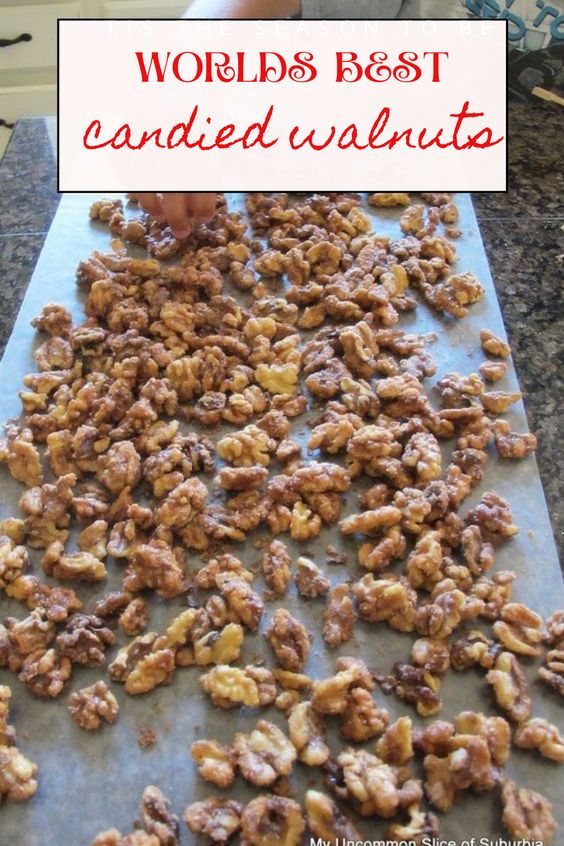 a person is making candied walnuts on a sheet of paper with the words world's best candied walnuts