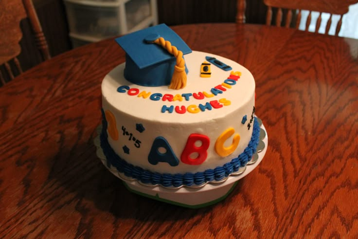 a birthday cake for a child's first year on a table in a home