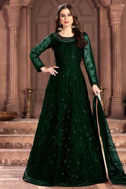 Cast a spell with this Dark Green Net Anarkali Suit Which will surely tell them that the diamonds aren't the only beautiful thing which they have seen. This Round neck and Full Sleeves Party Wear Attire highlighted with stone, sequins and dori work. Along with Santoon/Lycra Churidar in Dark Green Color with Dark Green Net Dupatta Wedding Anarkali, Costume Beige, Floor Length Anarkali, Designer Anarkali Suits, Gown Suit, Abaya Style, Gaun Fashion, Designer Salwar, Designer Anarkali