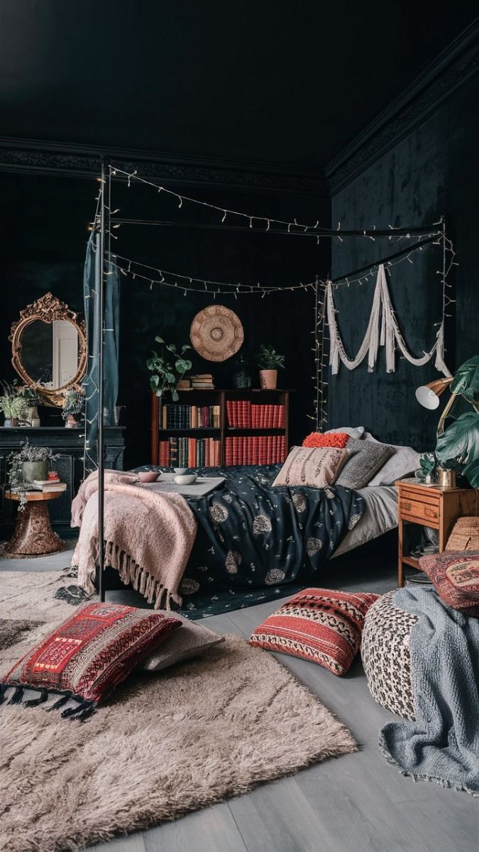 a bedroom with black walls and wooden floors, an iron bed frame, bookshelves, rugs, plants and other decor