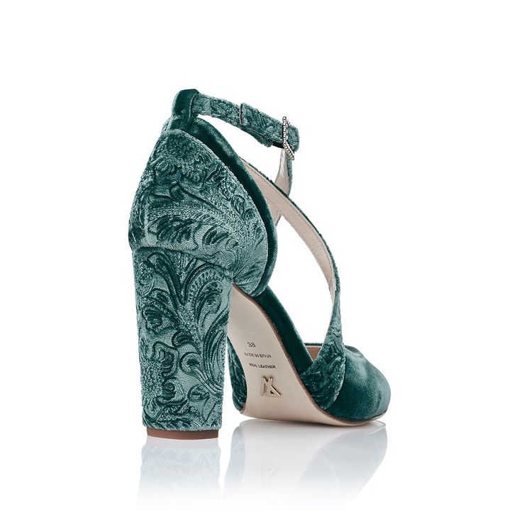 Description
Sizing / Details
Shipping / Return



 PETROL GREEN VELVET POINTY TOE SHOES WITH BLOCK HEEL AND CROSSED STRAPS IN BROCADE VELVET.

 
The Valenzuela cross-straps pump combines smooth and brocaded textures within eucalyptus green velvet. The swarovski buckle and gold base add an elegant touch to this romantic shoe.
This design is built on our 8.5cm pointed toe last, both the position of the foot and its internal gel padding guarantee comfort even if you are not very used to wearing heels.
The cut of this shoe allows you to combine different textures on the upper and crossing, giving a touch of light and personality to your shoes. In the same way, it is one of the most adaptable patterns since it holds in the case of thin feet and does not oppress in the case of having a wider fo Green Heels With Padded Heel, Green Open Heel Padded Heels, Green Open Heel Heels With Padded Heel, Green Open Heels With Padded Heel, Green Evening Heels With Heel Strap, Evening Green Heels With Heel Strap, Green Block Heels With Sculpted Detail, Green Block Heels With Sculpted Heel, Chic Green Open Heel Block Heels