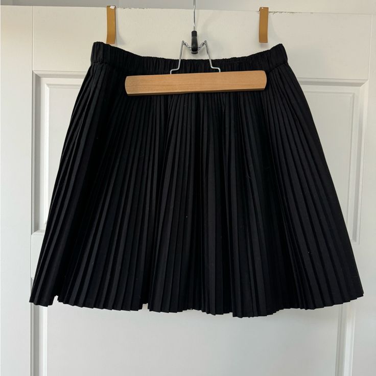 New With Tags Black, Pleated Mini Skirt From J. Crew. Xs Black You Can't Get More Classic Than A Pleated Mini Skirt That Goes With... - Everything. By Buying Cotton Products From J.Crew, You're Supporting Our Investment In Better Cotton's Mission To Help Cotton Communities Survive And Thrive While Protecting And Restoring The Environment. This Product Is Sourced Through A System Of Mass Balance And Therefore May Not Contain Better Cotton. 60% Cotton/40% Polyester. Elastic Waistband. Lined. Machi Black Stretch Pleated Short Skirt, Black Pleated Short Skirt For Spring, Black Short Pleated Skirt For Spring, Black Short Pleated Lined Skirt, Black Relaxed Pleated Skort, Black Pleated Relaxed Skort, Black Pleated Skort For Work, Black Pleated Mini Skirt, Tiered Mini Skirt