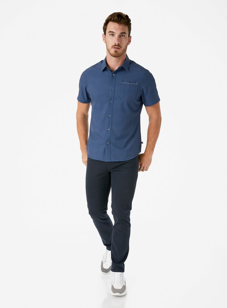 We created the perfect short sleeve button up, with the right mixture of comfort and style, just for you. Our performance shirts have 4-way stretch, are moisture wicking, wrinkle resistant and above all a great new addition to your wardrobe. The performance shirt will be your go-to for any occasion - day to night. This is a shirt that will have you satisfied at any given time. Details Model is 6'1" and wears a size medium. Care: Machine wash cold on delicate cycle with similar colors. Do not use Casual Cotton Shirt With 4-way Stretch, Casual 4-way Stretch Shirt For Work, Casual Shirt With 4-way Stretch For Workwear, Casual Short Sleeve Shirt With 4-way Stretch, Functional Short Sleeve Cotton Shirt, Blue 4-way Stretch Short Sleeve Tops, Workwear Tops With Functional Buttons And Short Sleeves, Blue Short Sleeve Top With 4-way Stretch, Fitted Short Sleeve Versatile Shirt