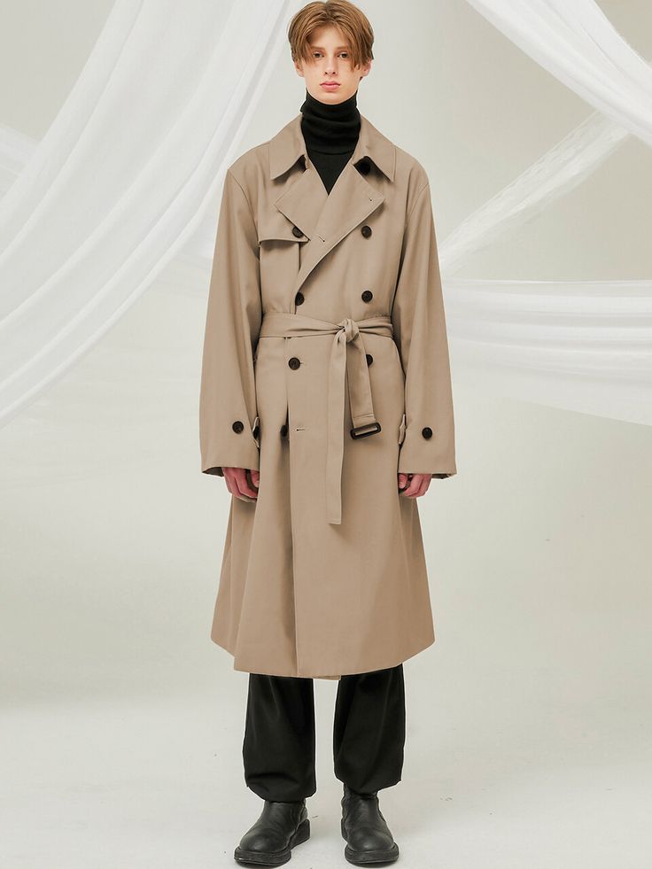 Editor's NotesFLARE UP’s trench coat features water-proof, silky fabric and oversized fit.- Button closure- Long sleeves- Button detail at cuffs- Oversized fit- Silky, water-proof fabric- Belt detail around waist- Side pocketsMeasurements(in.)0 / 1 / 2- Shoulder: 19.7in. / 19.9in. / 20.5in.- Sleeve: 24.4in. / 25.0in. / 25.6in.- Chest: 24.0in. / 24.8in. / 25.6in.- Length: 44.9in. / 46.1in. / 46.9in.*Model Info(Men): 6’2’’ Fitting Size 1,2*Model Info(Women): 5’9’’ Fitting Size 2*Model Info(Women): Beige Gabardine Outerwear With Button Cuffs, Classic Oversized Outerwear With Belted Cuffs, Oversized Double-breasted Outerwear With Belted Cuffs, Winter Workwear Raincoat With Button Closure, Trench Coat Beige, Oversized Trench, Oversized Trench Coat, Silky Fabric, Fabric Belt