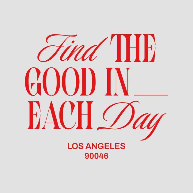 the words find the good in each day are red and black on a gray background