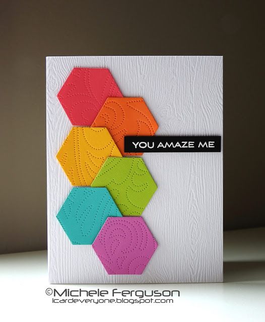 a greeting card with colorful hexagons on it and the words you amaze me