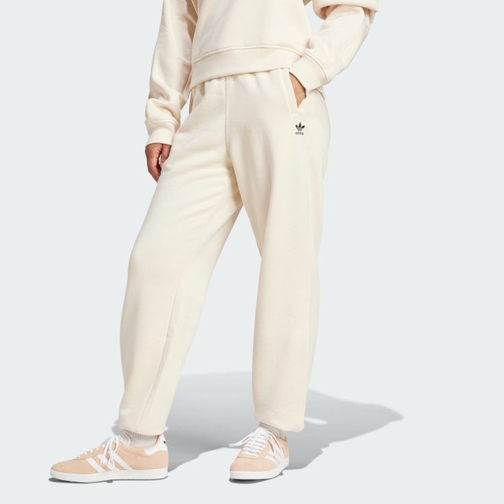 adidas Shop the Essentials Fleece Loose Joggers - White at adidas.com/us! See all the styles and colors of Essentials Fleece Loose Joggers - White at the official adidas online shop. Adidas Relaxed Fit Sweatpants In Sportswear Style, Adidas Relaxed Fit Jogging Bottoms, Adidas Relaxed Fit Sweatpants Sportswear, Adidas Athleisure Joggers For Loungewear, Relaxed Fit Athleisure Adidas Joggers, Casual Relaxed Fit Sweatpants With Three Stripes, Adidas Sweatpants For Loungewear In Athleisure Style, Adidas Sweatpants For Loungewear, Adidas Sweatpants For Loungewear, Athleisure Style