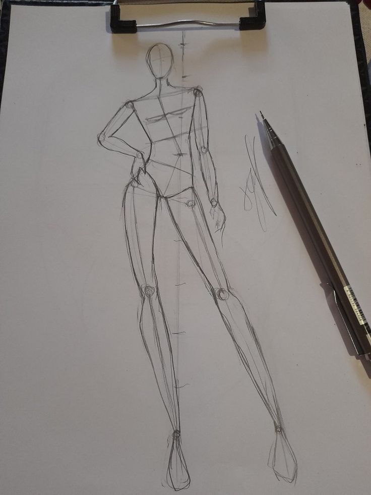 a drawing of a female figure next to a pen