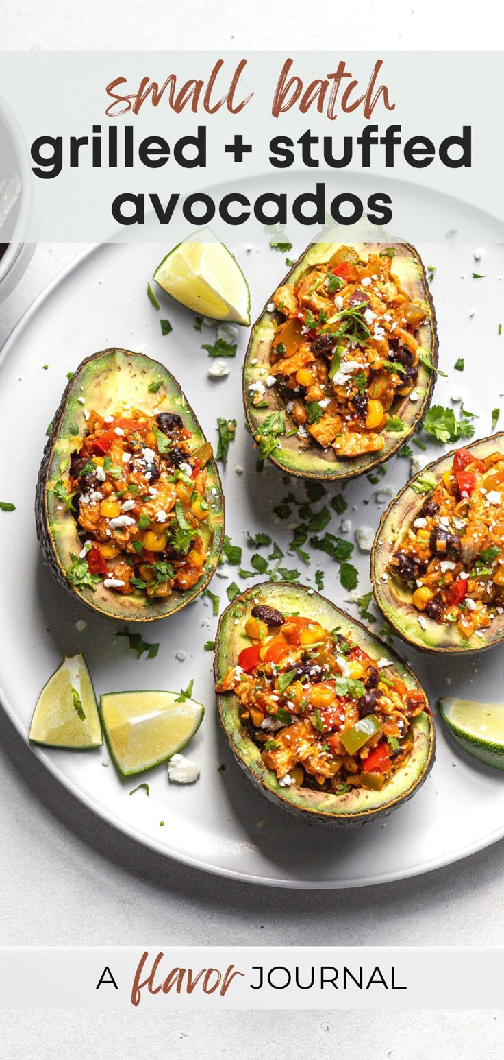 small batch grilled stuffed avocados on a white plate