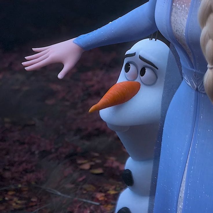 the frozen queen and snowman appear to be hugging each other