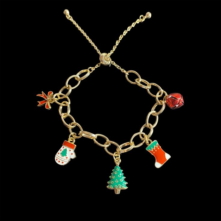 Spread joy this festive season with a gift that keeps on giving! These charms are a delightful reminder of what we celebrate during the winter months and will bring positive energy to those you hold dear. Share the warmth and cheer with a meaningful present that will brighten the holidays for your loved ones. Gold Christmas Festive Bracelets, Gold Adjustable Charm Bracelet For Christmas, Christmas Charm Bracelet Gift, Christmas Holiday Bracelet Jewelry, Christmas Gift Charm Bracelet, Christmas Holiday Jewelry Bracelet, Adjustable Charm Bracelet For Christmas Gift, Adjustable Christmas Charm Bracelet For Gifts, Christmas Gift Bracelet Jewelry