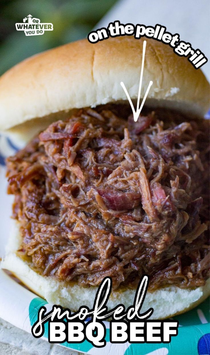 a pulled pork sandwich on a bun with the words smoked bbq beef