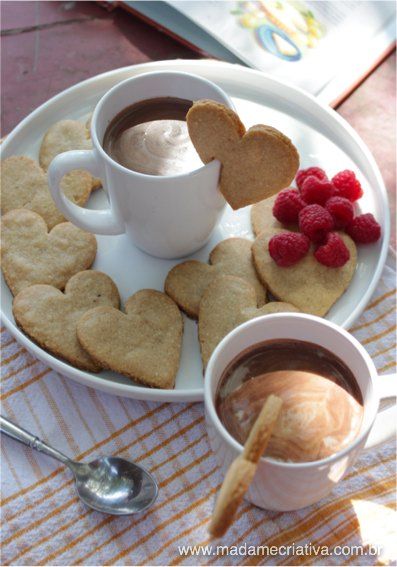 heart shaped cookies and coffee on a plate