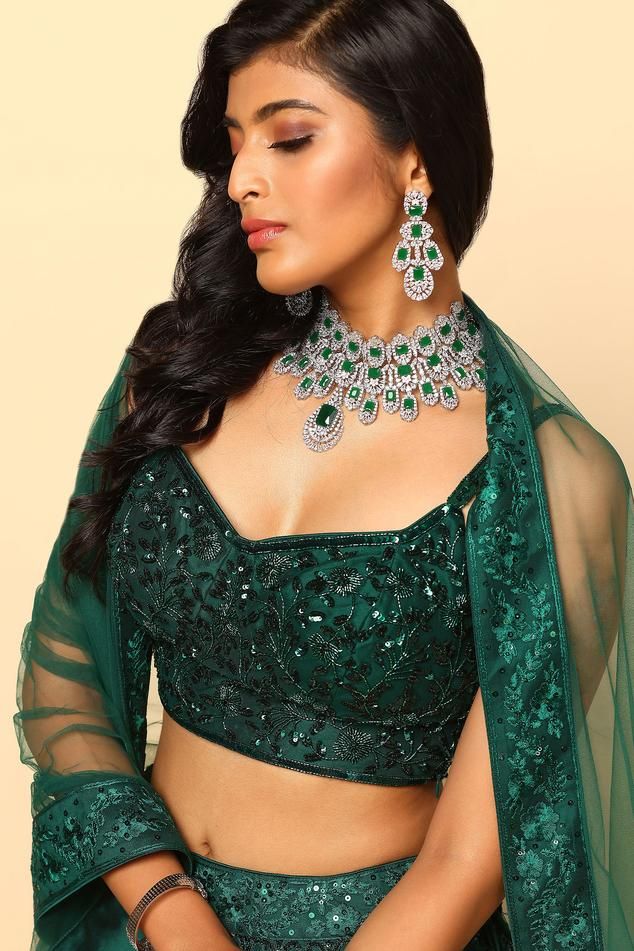 Bottle green attached cancan lehenga with tonal sequin embroidery. Paired with a padded embroidered blouse and dupatta with embroidered border.
Components: 3
Pattern: Embroidered
Type Of Work: Sequin, Thread
Neckline: Sweetheart
Sleeve Type: Sleeveless
Fabric: Net Embroidery, Plain Net
Color: Green
Other Details: 
Padded top
Attached cancan
Attached lining
Approx. product weight: 4.5 kg
Length:
Blouse: 14.5 inches
Lehenga: 45 inches
Model Height: 5ft 9inches, wearing size M
Lehenga closure: Zipp Cancan Lehenga, Net Embroidery, Embroidered Lehenga, Types Of Work, Padded Top, Embroidered Border, Sequin Embroidery, Sequins Embroidery, Bottle Green