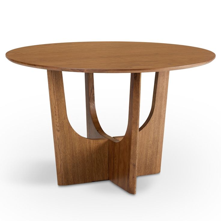 a round wooden table with an unusual design on the top and bottom, against a white background