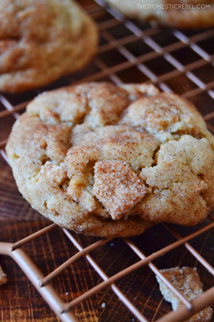 some cookies are cooling on a wire rack