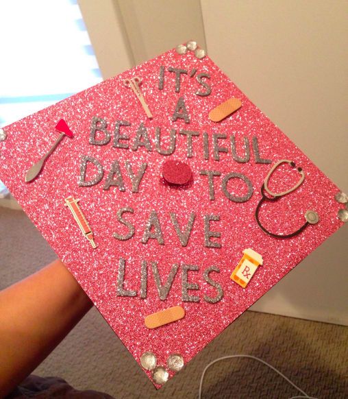 a pink graduation cap that says it's a beautiful day to save lives on it