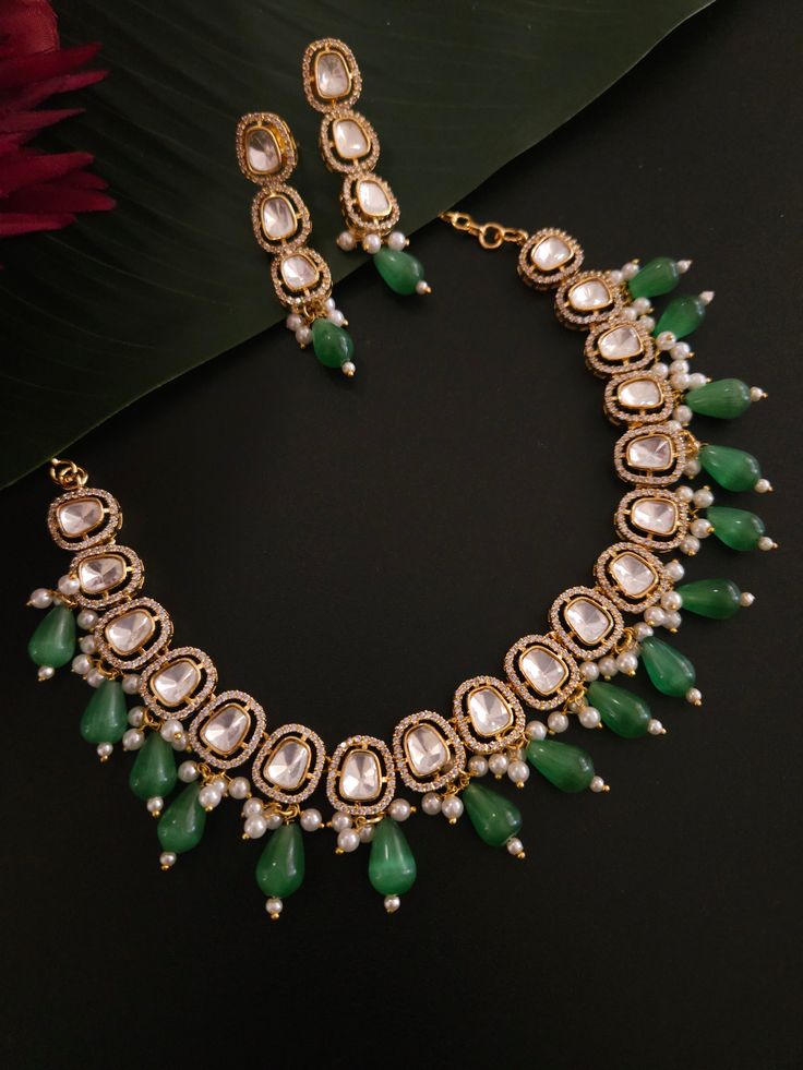 Very Gorgeous and elegant Polki stone Versatile. Can be paired with number of outfits.Perfect to wear at weddings occasions.Highest quality and craftsmanshipLength around 1inches Wedding Crystal Plated Necklaces, Kundan Necklace For Party With Hand Set Stones, Festive Crystal Necklaces For Reception, Party Crystal Plated Necklaces, Party Kundan Necklace With Crystal Stone Work, Kundan Necklaces With Elegant Design For Parties, Crystal Kundan Necklace With Stone Work For Party, Elegant Kundan Necklaces With Stone Work, Party Kundan Necklace With Elegant Design