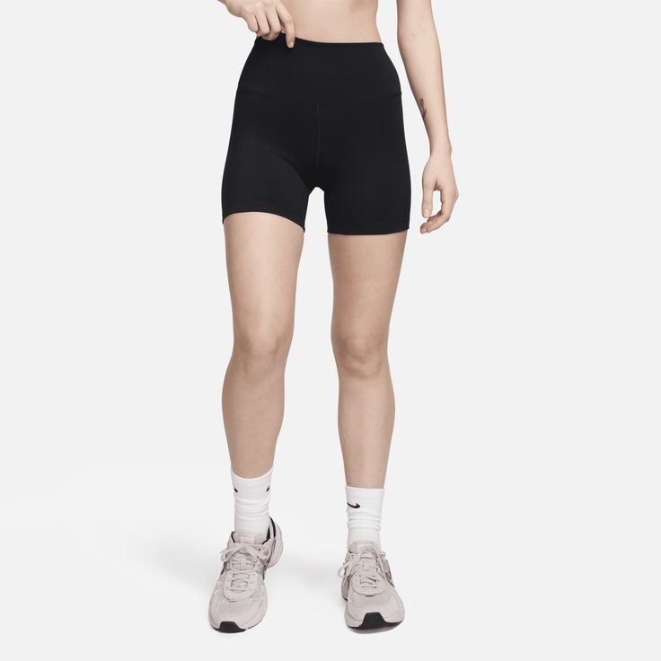 Up for a workout or down to chill, these biker shorts are the Ones that are ready for whatever you are. Their midweight, peachy-soft fabric stretches with your every move and dries quickly. Plus, a high waist is designed to meet your favorite cropped tops for a head-to-toe look that you can feel confident and comfortable in all day long. Basic Activewear With Built-in Shorts, Solid Biker Shorts With Built-in Shorts For Gym, Biker Shorts With Built-in Shorts For Training, Compression Biker Shorts With Built-in Shorts, Sporty High-stretch Biker Shorts, Mid-thigh Length, Nike Activewear With Built-in Shorts For Workout, Casual High Stretch Squat Proof Shorts, High Stretch Squat Proof Casual Shorts, Sportswear Biker Shorts With Built-in Shorts For Workout