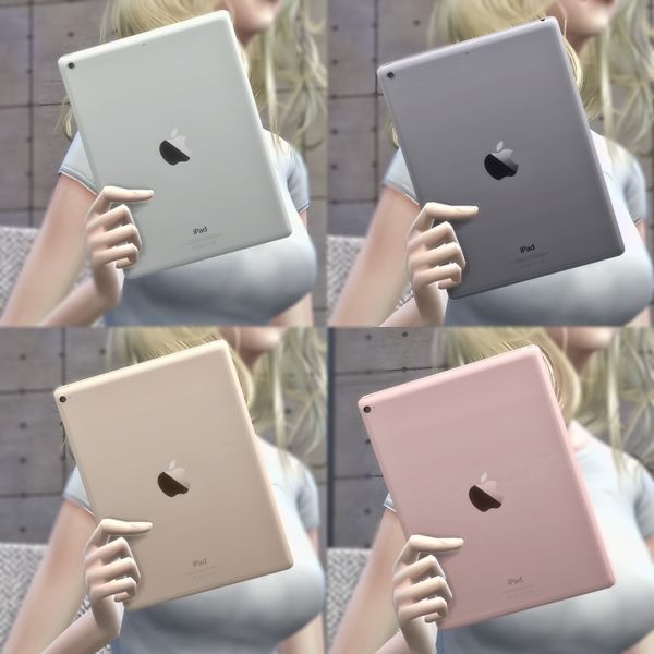 the woman is holding four different ipads in her hands