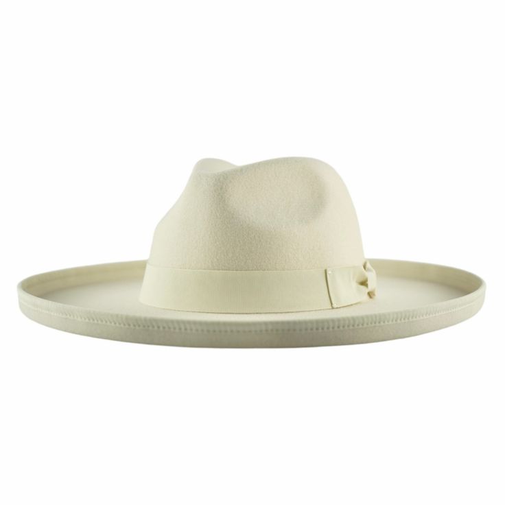 Dallas features a classic fedora crown in combination with a pencil-rolled brim and a traditional bowtie style headband accent. The body of the hat is made from polyester that is not only comfortable to wear, but is very firm too, and offers a rigid brim. Adjustable inner-headband to ensure the perfect fit Available in sizes: Medium 55-57cm and Large 58-60cm Specifications:Crown Height: 4.85"Brim Width: 3.75”Pencil Curl Height: .75”Material: Polyester All hats ship from Dallas, Texas. Classic Spring Fedora Felt Hat, Classic Wide Brim Top Hat For Spring, Classic White Felt Hat With Short Brim, Classic White Hat Bands For Spring, Classic Spring Fedora With Curved Brim, Classic White Felt Hat For Summer, Spring Classic Fedora With Curved Brim, Classic Flat Brim Fedora For Spring, Classic Flat Crown Felt Hat For Spring