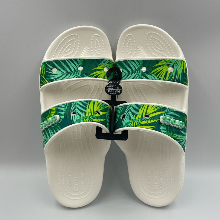 Crocs Classic Tropical Sandals Women’s Sz 10 Brand New With Tags!! * No Rips Or Tears *Smoke Free! *Photos Are Of The Actual Product *Packaged With Care *Ships In 1 Business Day *Buy With Confidence Reasonable Offers Welcome! We List New Items Weekly! Don’t Miss Out, Follow Us Now! Reach Out To Us If You Have Any Questions! White Closed Toe Casual Flip Flops, Casual White Closed Toe Flip Flops, White Closed Toe Casual Slides, White Casual Closed Toe Slides, Casual White Closed Toe Slides, White Slip-on Sandals For Beach Season, Casual White Sandals For Vacation, White Casual Slides For Vacation, Green Casual Beach Slides