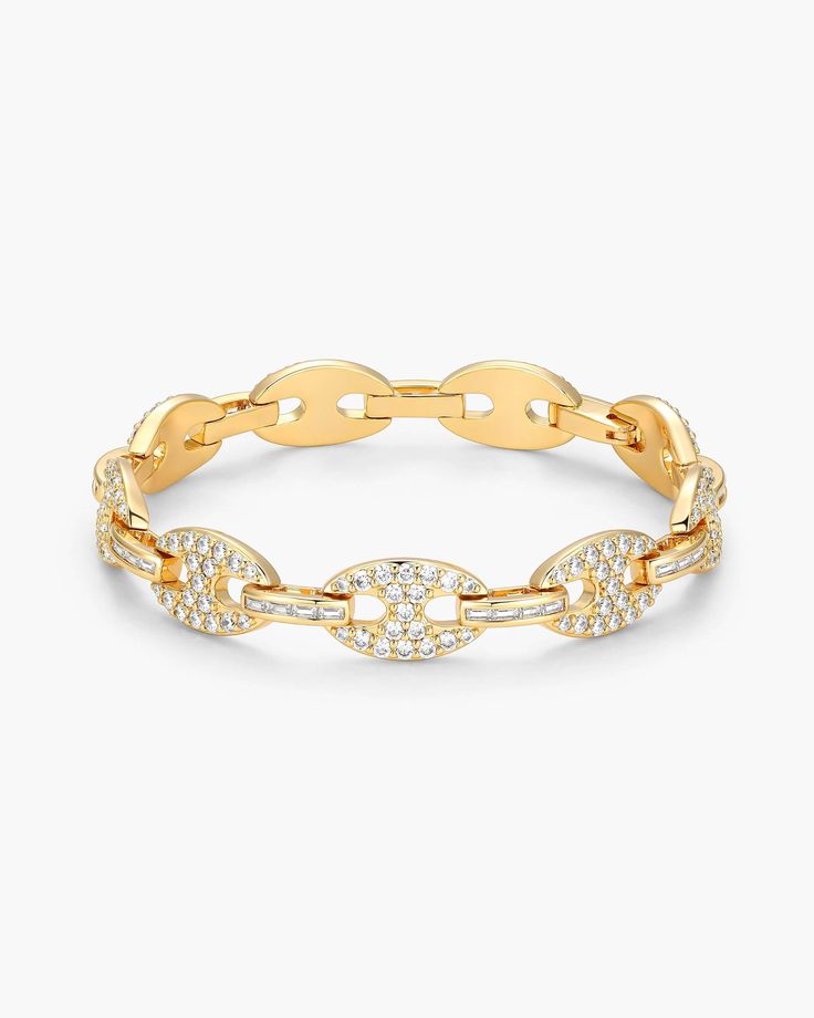 Let us introduce an iced out bracelet that combines dazzling stones and an eye-catching design. The gold 10mm Iced Out Mariner bracelet has anchor-like links with round and baguette cut diamond simulants and a secure clasp that disappears for a seamless style. Iced Out Bracelet, Studded Bracelet, Mens Gold Bracelets, Solid Gold Chains, Diamond Simulant, Baguette Cut Diamond, Silver Shop, Mens Gold, Baguette Cut